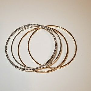 Set of 4 gold and silver bangles